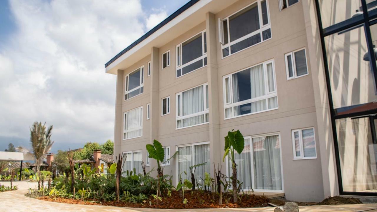 Termales El Otono Hotel Manizales Exterior photo The new library building